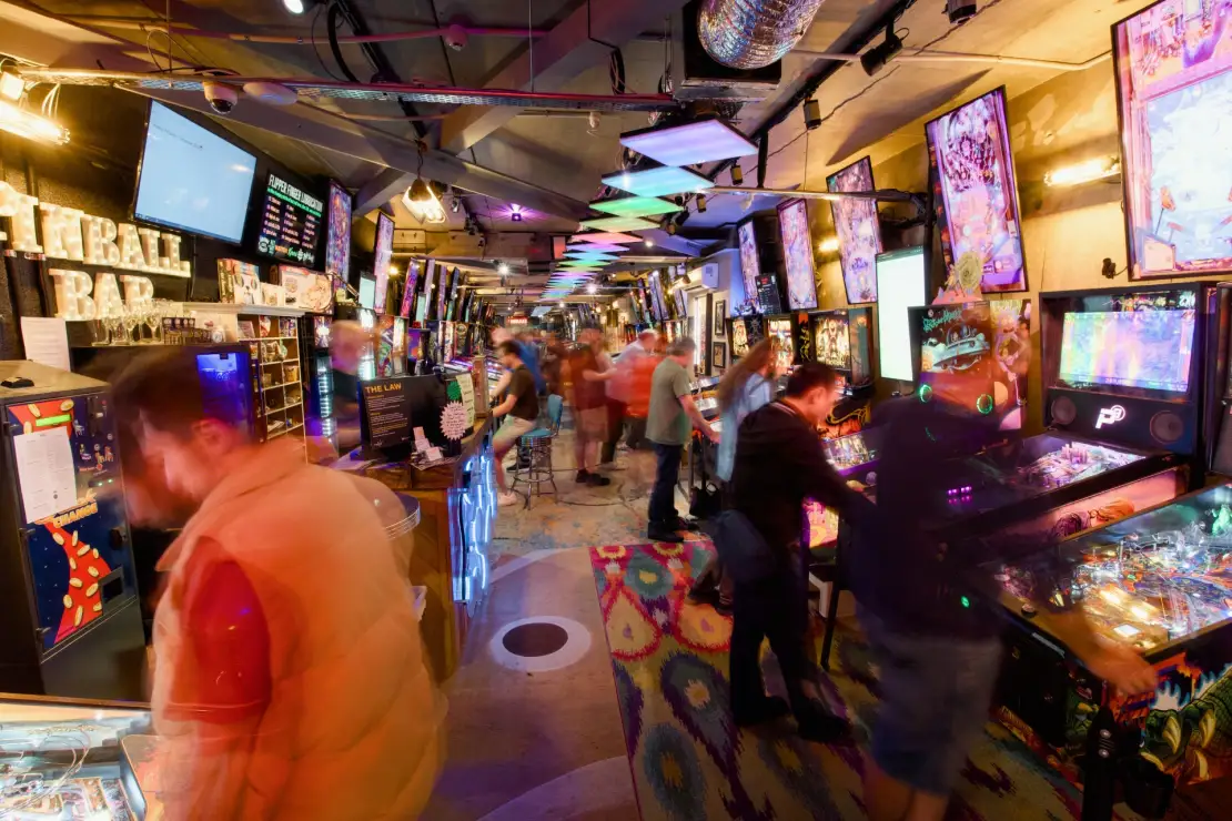 People of all ages enjoy playing pinball
